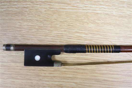 A violin bow by August Edwin Prager, nickel-mounted, stamped, L 74.5cm, 56gr